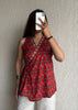 Red sleeveless wrap-tie short kurti