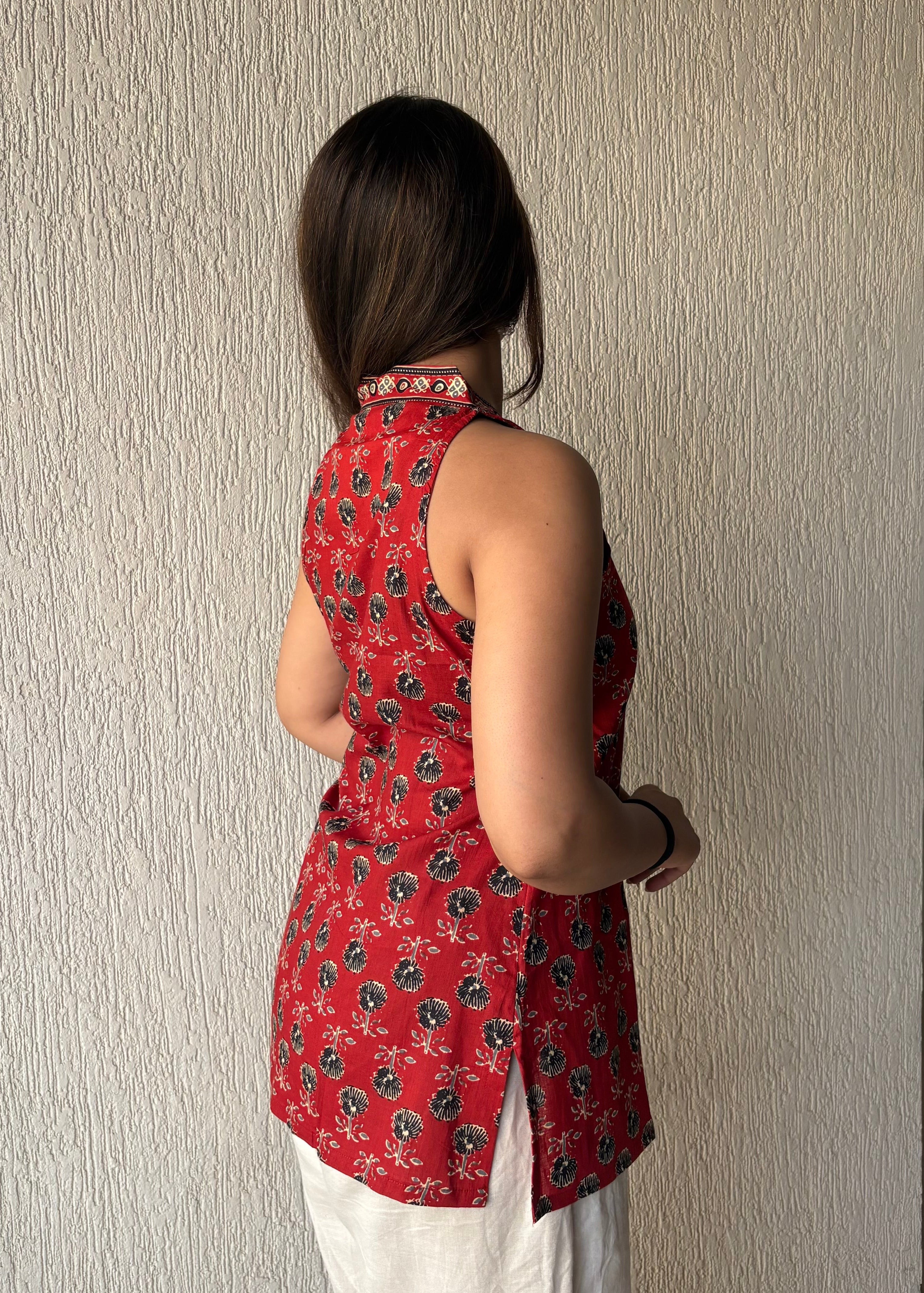 Red sleeveless wrap-tie short kurti