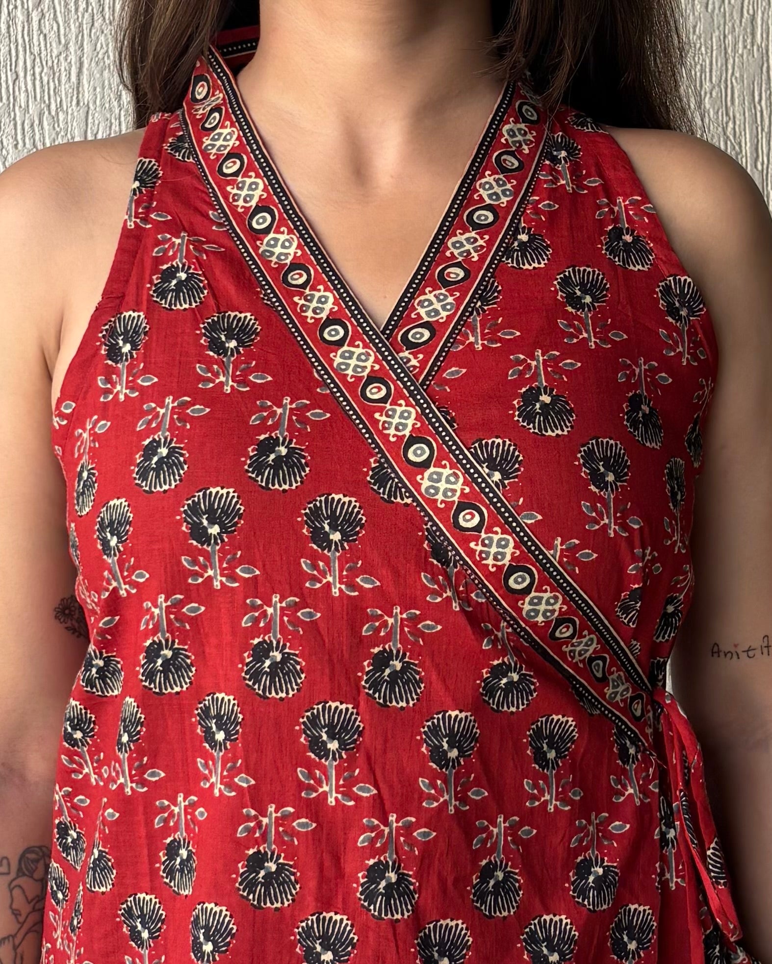 Red sleeveless wrap-tie short kurti