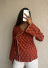 Rust bandhani wrap-tie short kurti