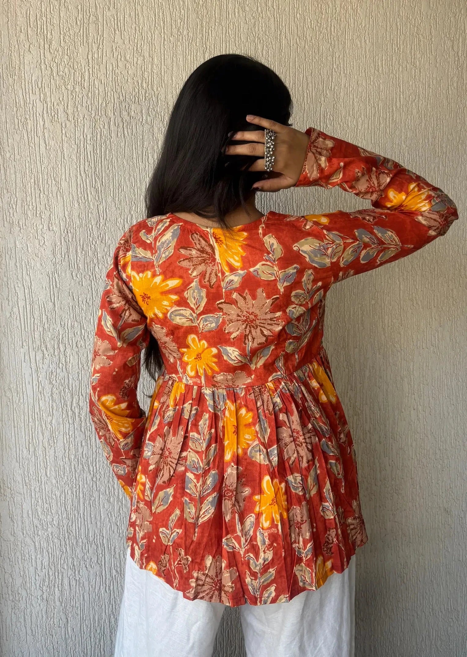 Orange peplum style cotton short kurti