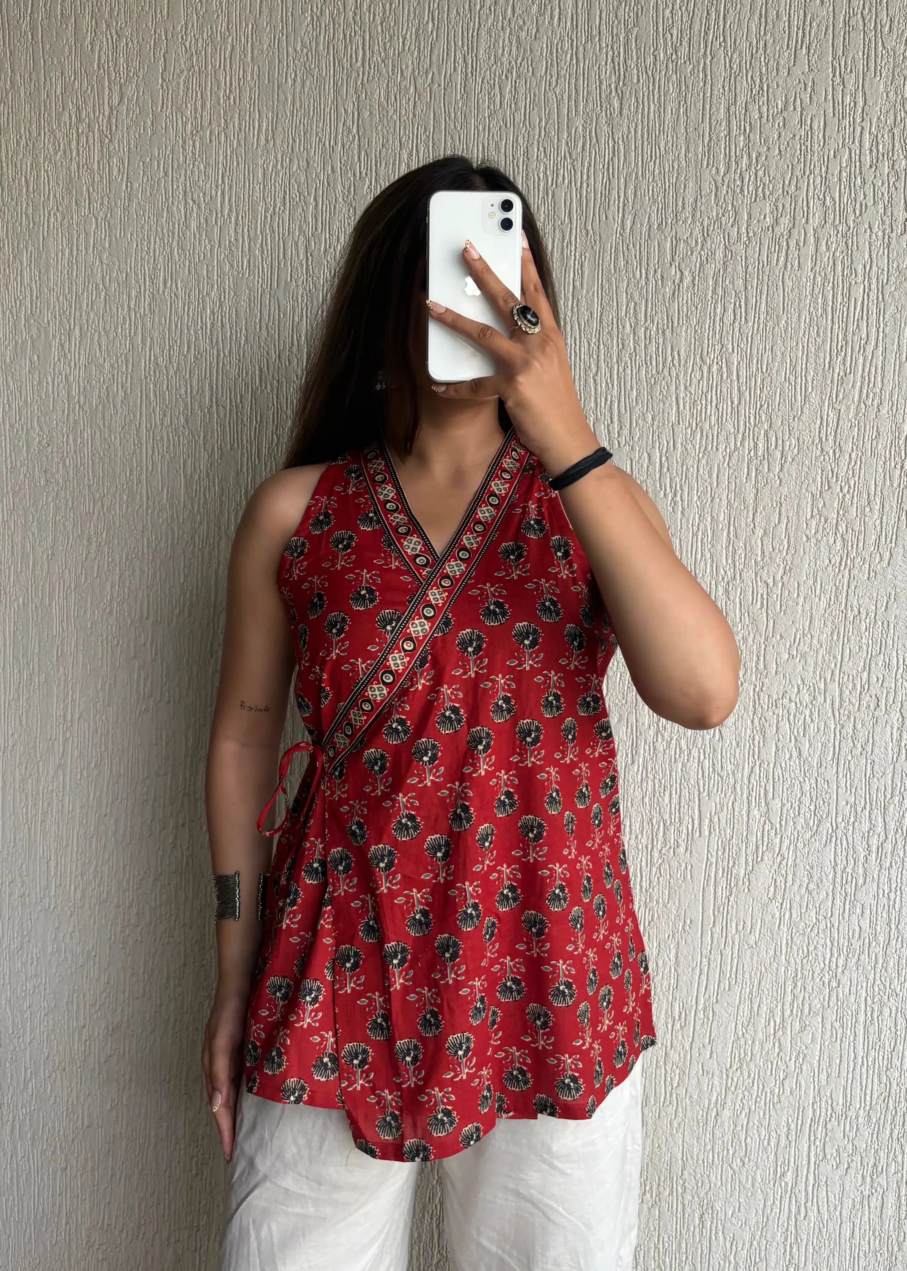 Red sleeveless wrap-tie short kurti